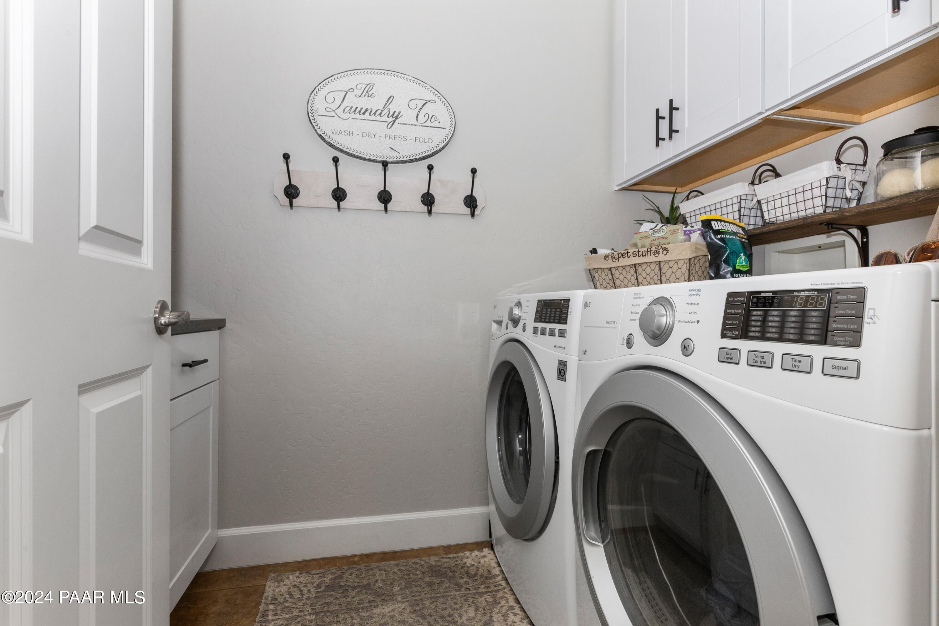 1219 Stack Rock Road Prescott Valley, AZ 86314 - Photo 27 of 41 a view of livingroom with washer and dryer