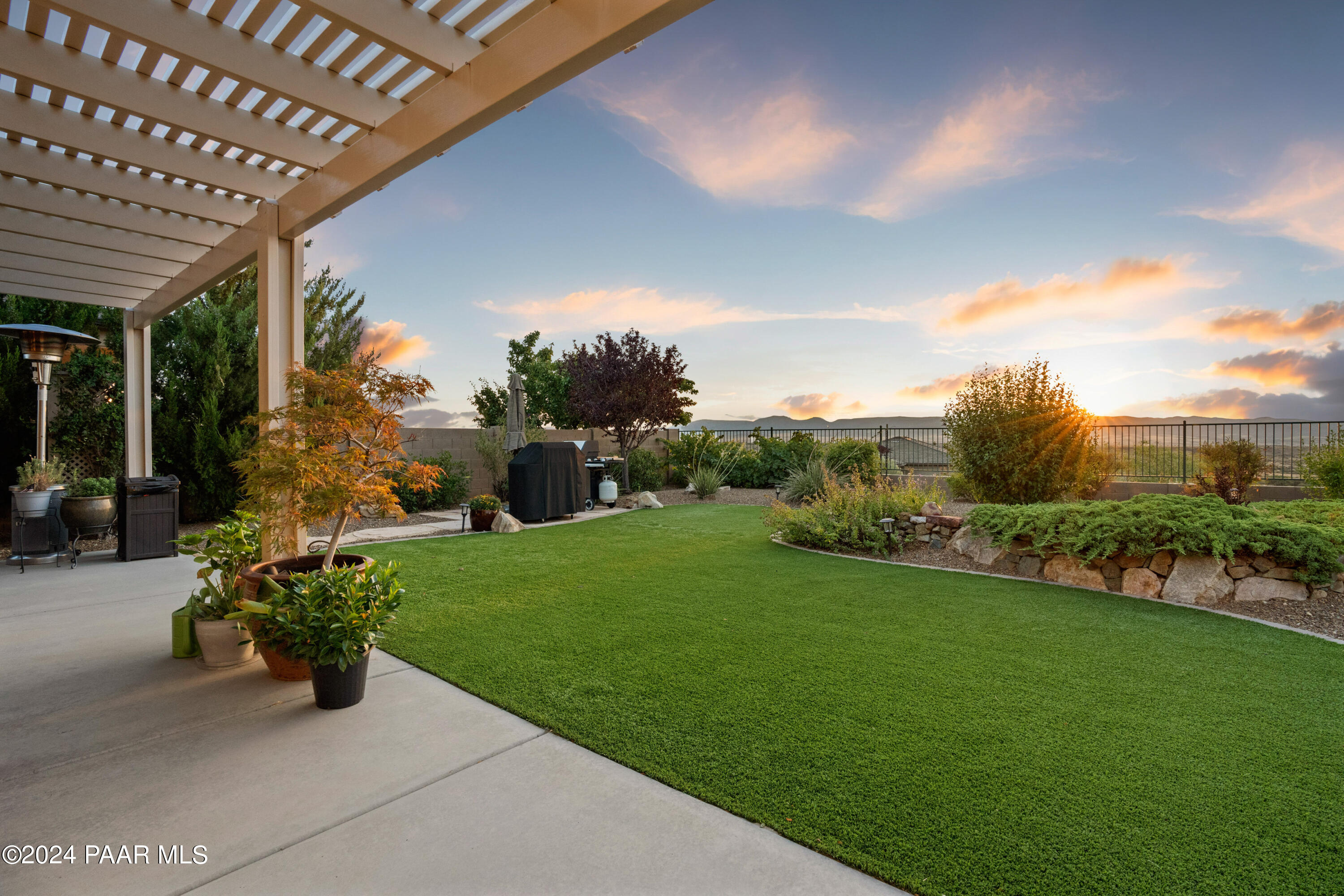 1219 Stack Rock Road Prescott Valley, AZ 86314 - Photo 38 of 41 a view of a garden with patio