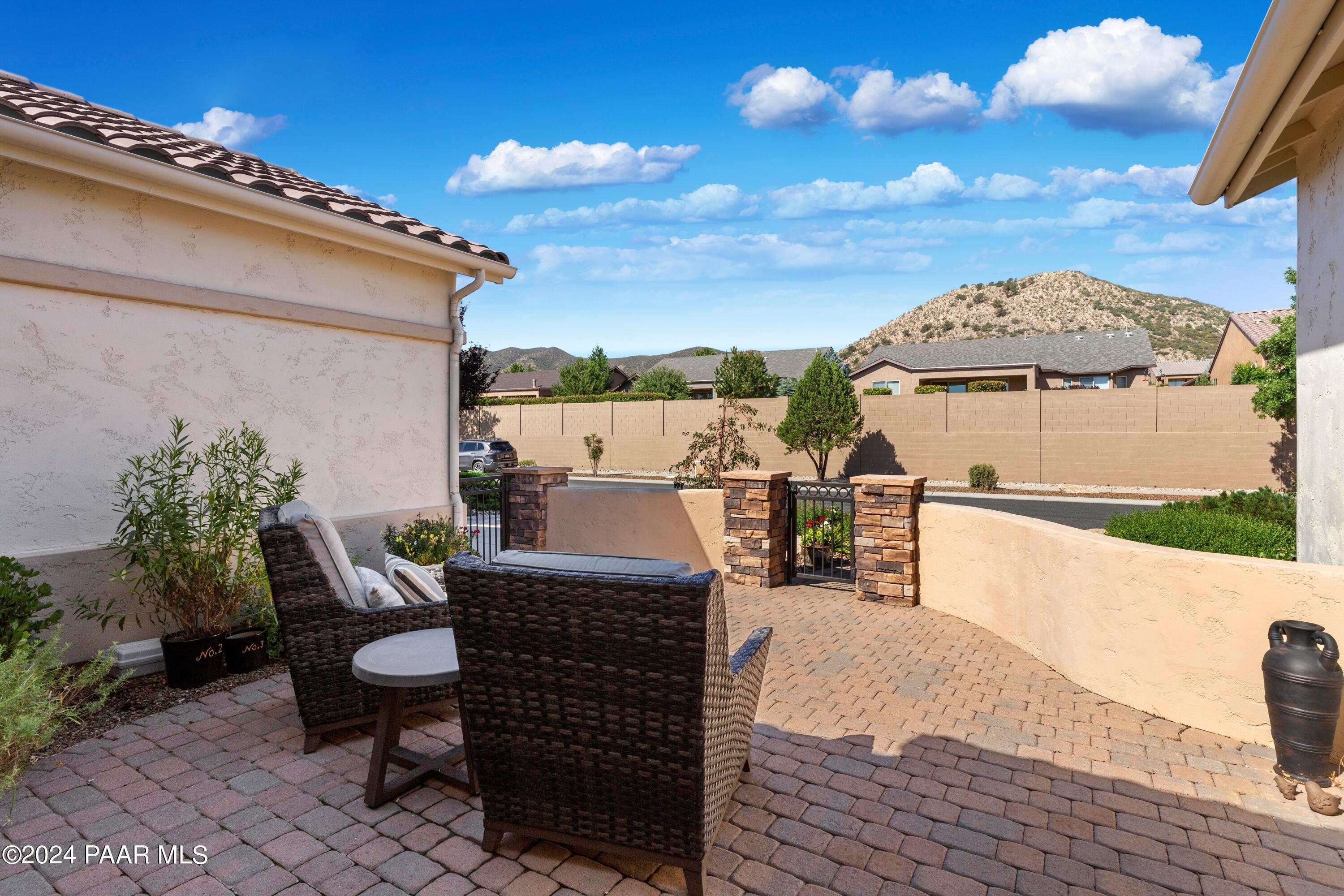 1219 Stack Rock Road Prescott Valley, AZ 86314 - Photo 5 of 41 a view of a terrace with furniture and a patio