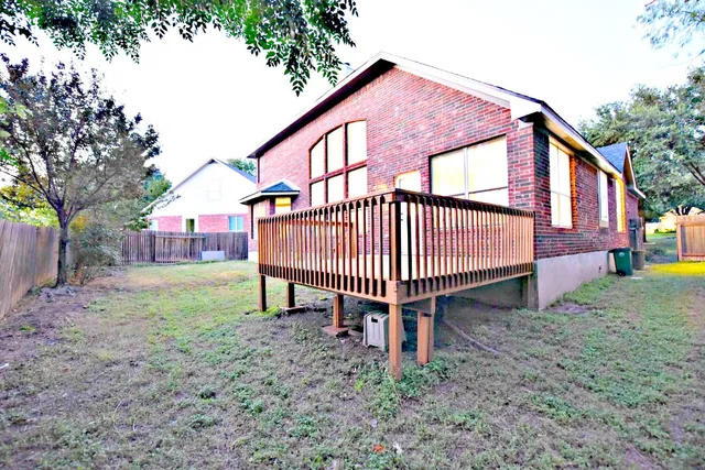 a view of backyard of house