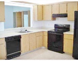 137 Raintree Trail Jupiter, FL 33458 - Photo 11 of 21 Kitchen with pass thru window