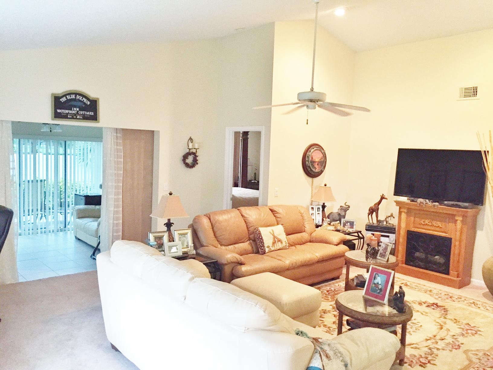 137 Raintree Trail Jupiter, FL 33458 - Photo 2 of 21 Living Room to Florida Room