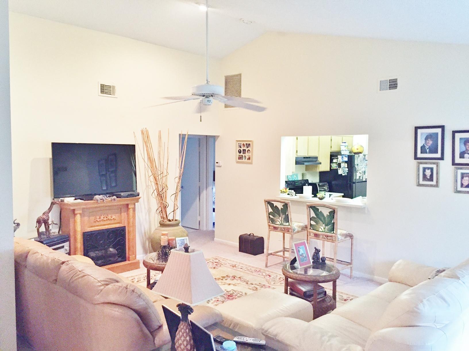 137 Raintree Trail Jupiter, FL 33458 - Photo 5 of 21 Living Room to Kitchen