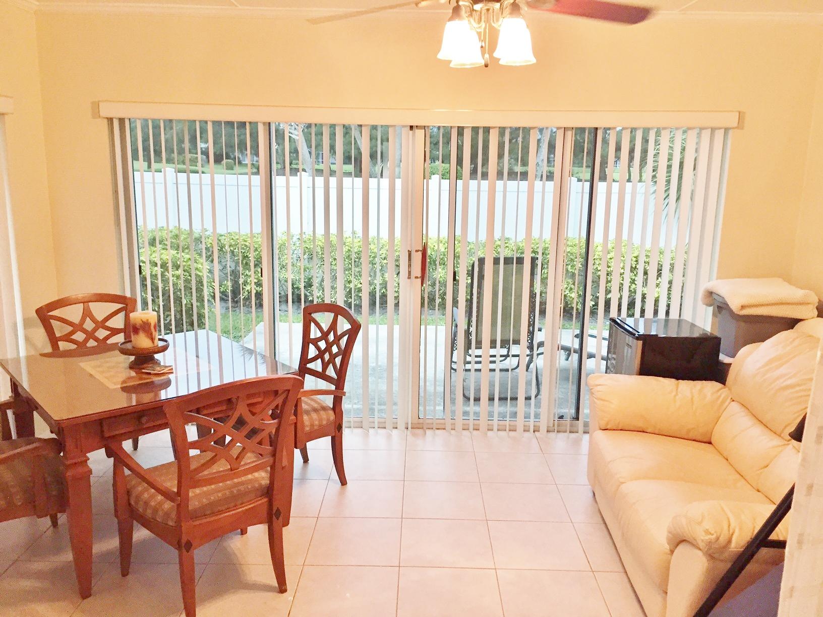 137 Raintree Trail Jupiter, FL 33458 - Photo 6 of 21 Florida Room with Sliders to Patio