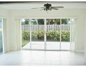 137 Raintree Trail Jupiter, FL 33458 - Photo 7 of 21 Florida Room with Sliders to Patio