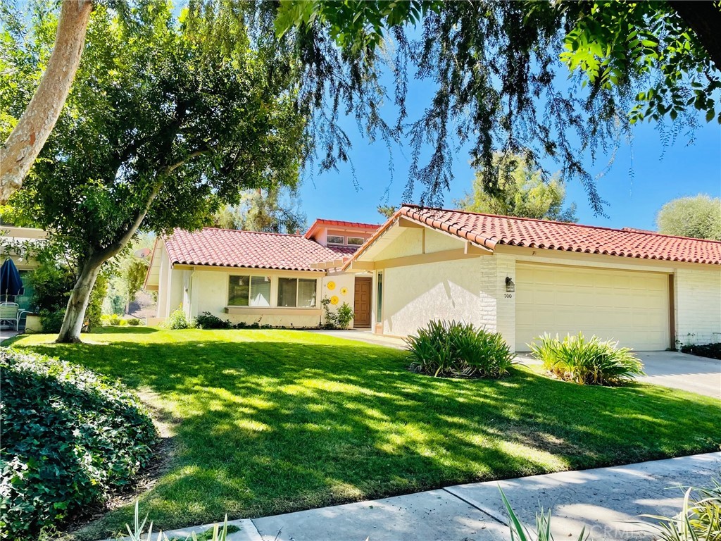 700 Vía Zapata Riverside, CA 92507 - Photo 1 of 1 a front view of a house with garden