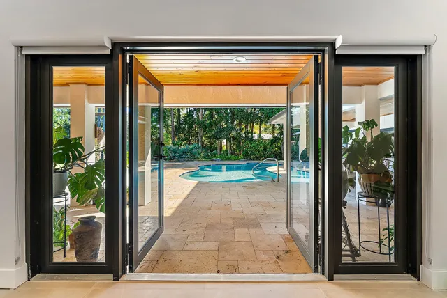 a view of porch with a floor to ceiling window and an outdoor view