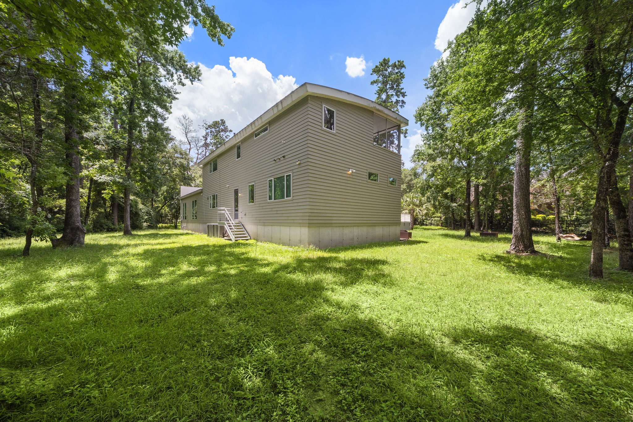 118 Angel Leaf Road The Woodlands, TX 77380 - Photo 44 of 50 Wide-open yard backing to private preserve.