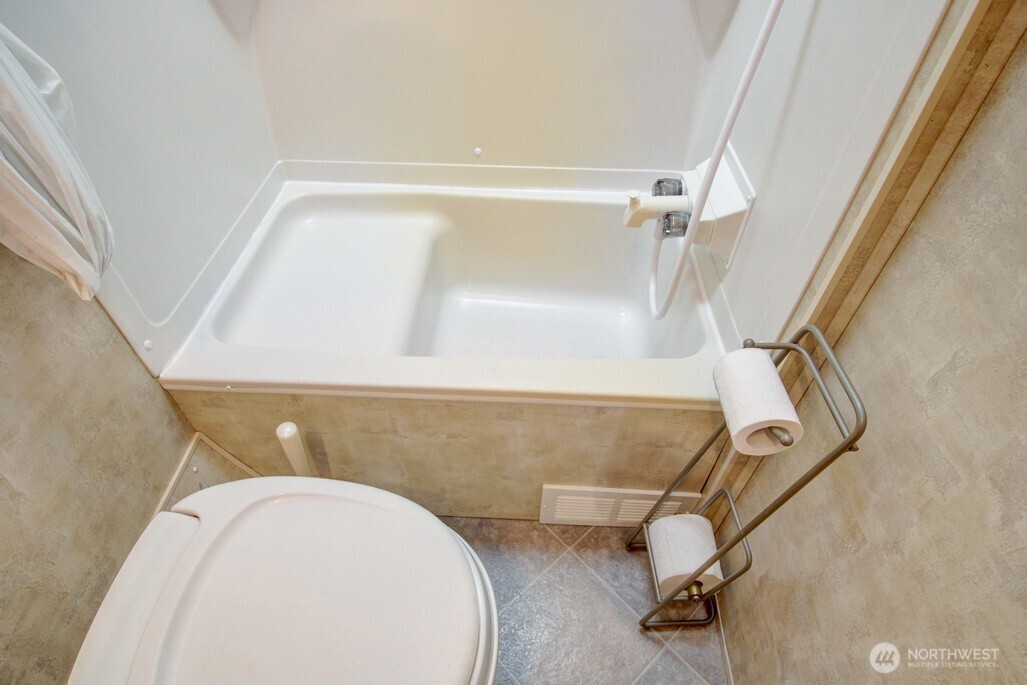 71 Wilderness Way Deming, WA 98244 - Photo 16 of 30 a bathroom with a sink and a shower