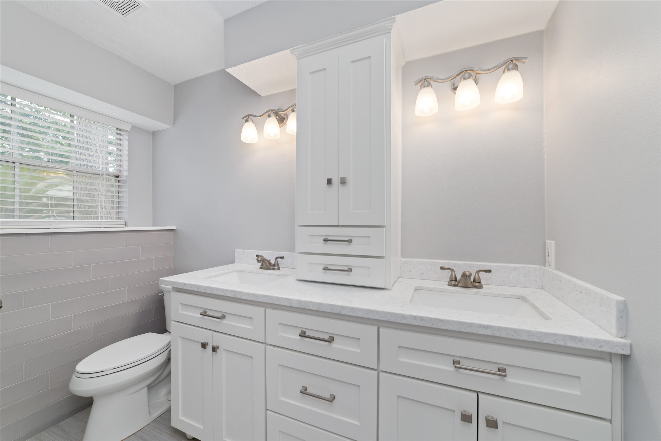 7910 Oak Moss Drive Spring, TX 77379 - Photo 16 of 38 Tidy, cozy master bathroom with new features and a cabinet drawer.