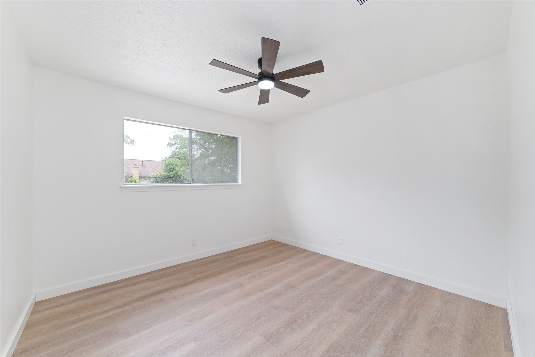 7910 Oak Moss Drive Spring, TX 77379 - Photo 21 of 38 A third bedroom on the 2nd floor.