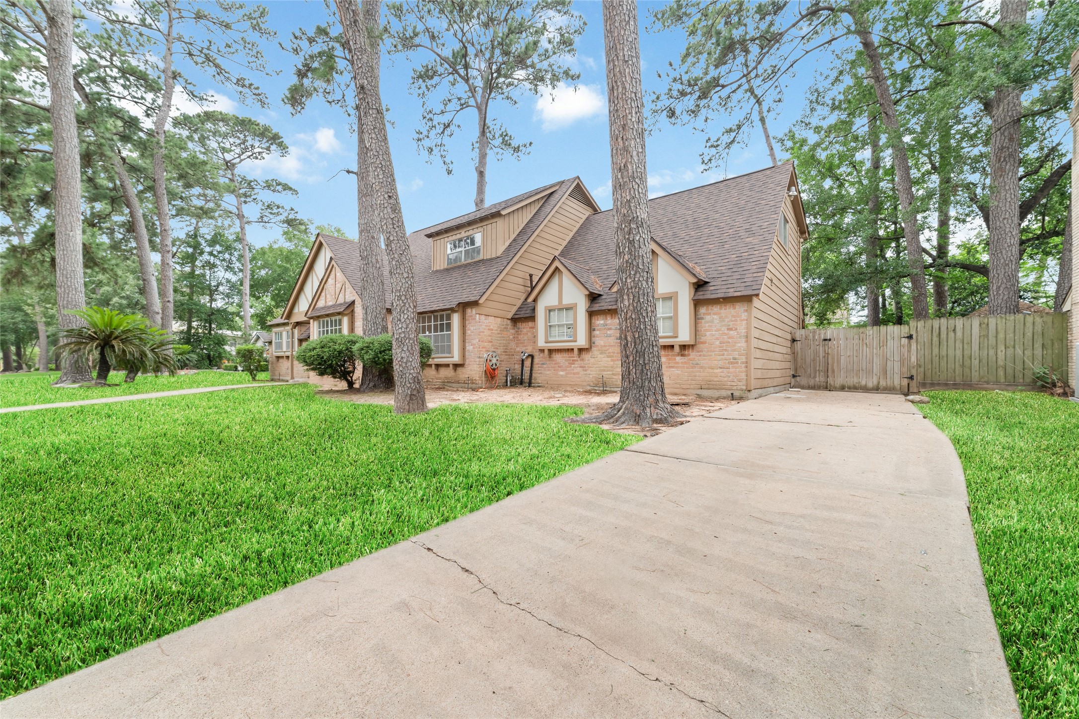 7910 Oak Moss Drive Spring, TX 77379 - Photo 26 of 38 A long driveway can accommodate many parkings