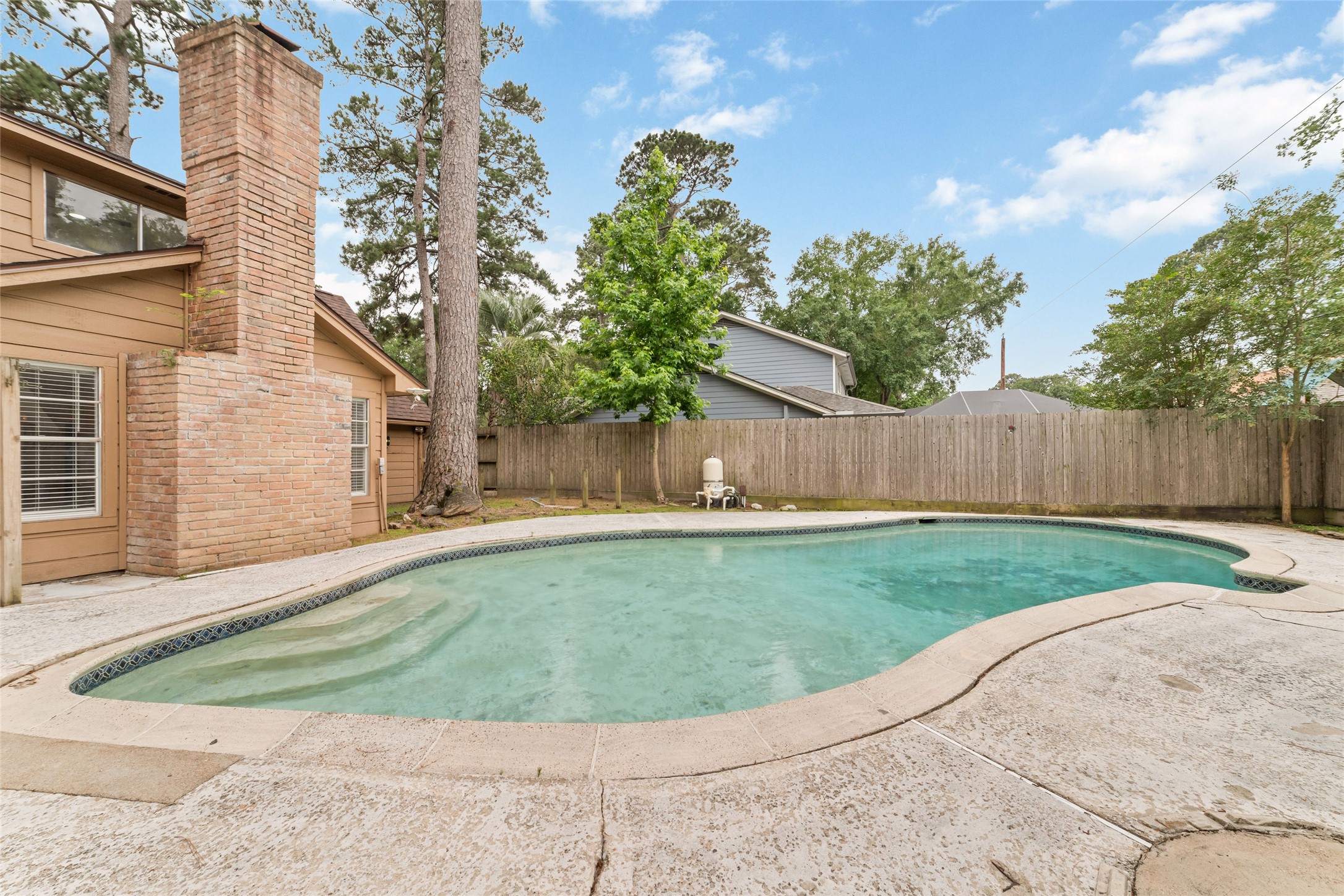 7910 Oak Moss Drive Spring, TX 77379 - Photo 28 of 38 A good size pool was created for Houston summer heat