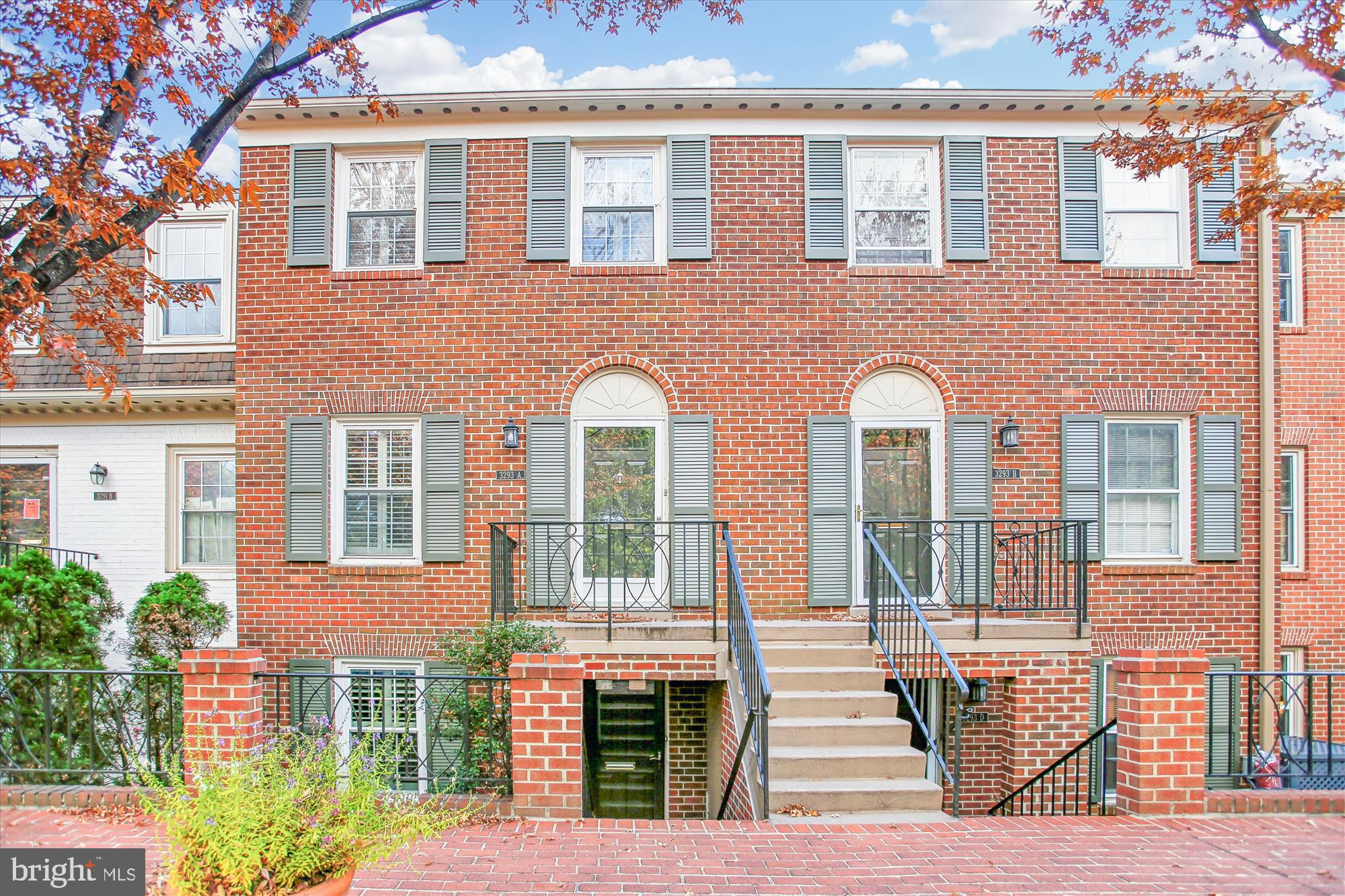 a front view of a house with glass windows