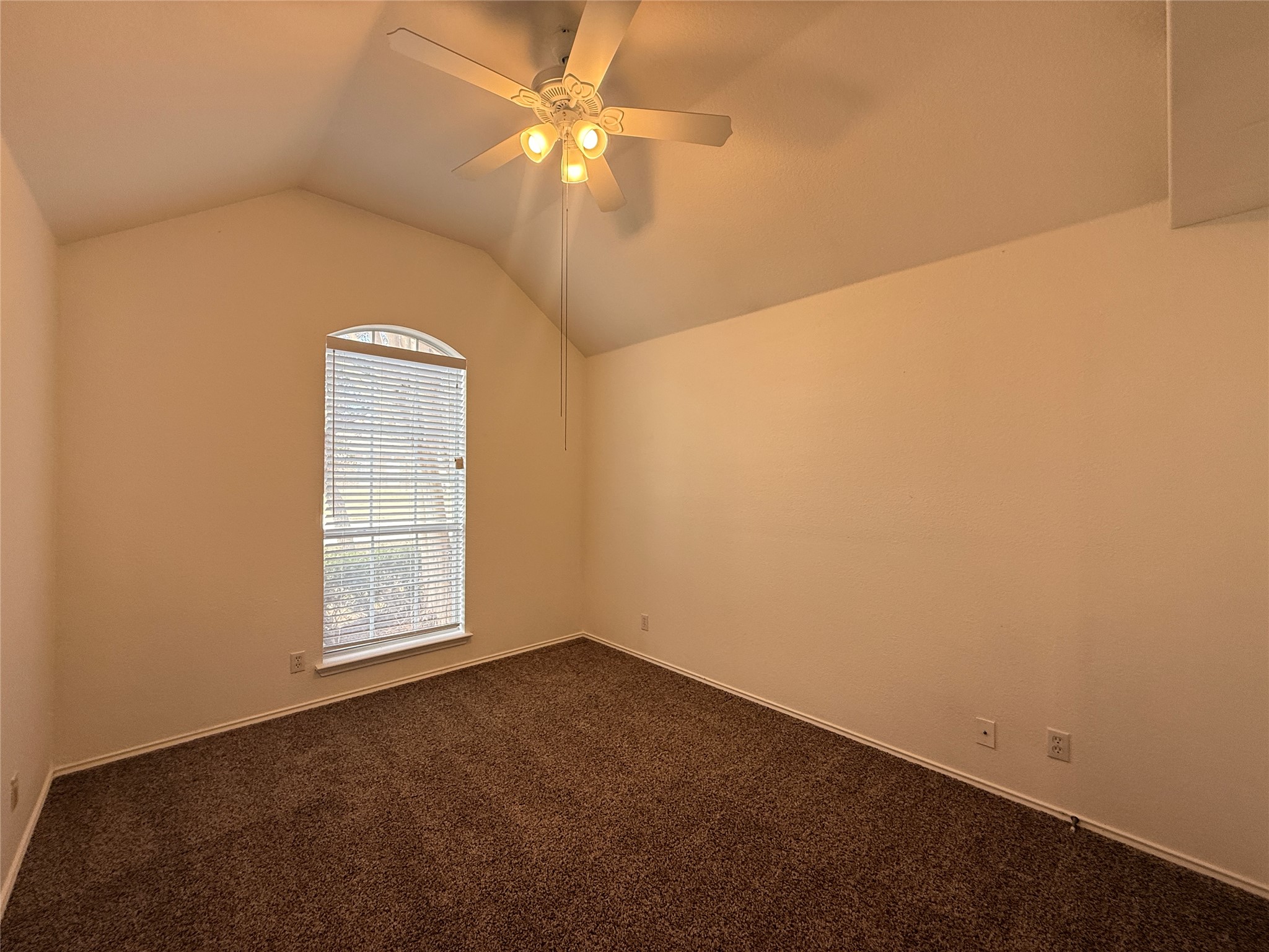 708 Spring Brook Lane Leander, TX 78641 - Photo 18 of 27 Unfurnished room featuring ceiling fan and dark colored carpet