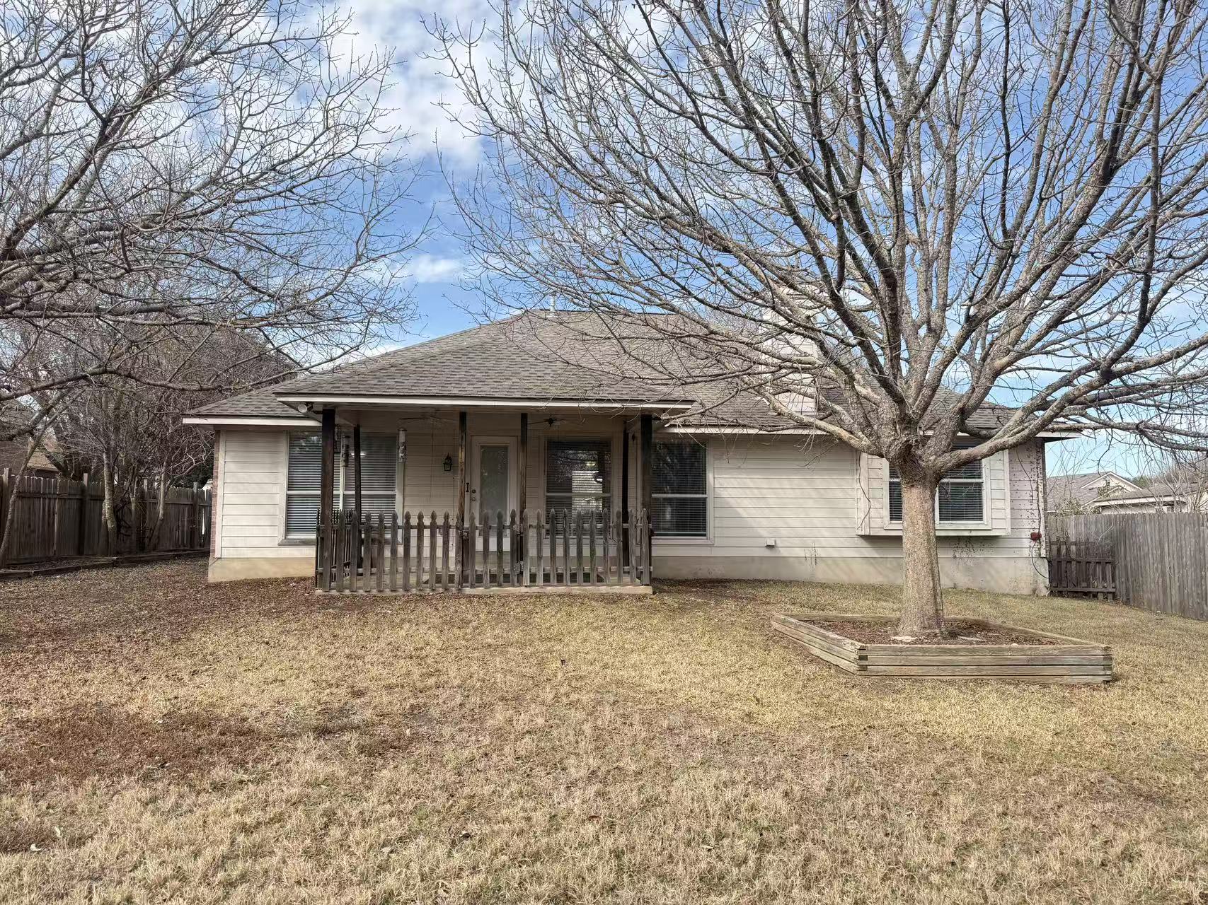 708 Spring Brook Lane Leander, TX 78641 - Photo 23 of 27 Back of property featuring a shingled roof