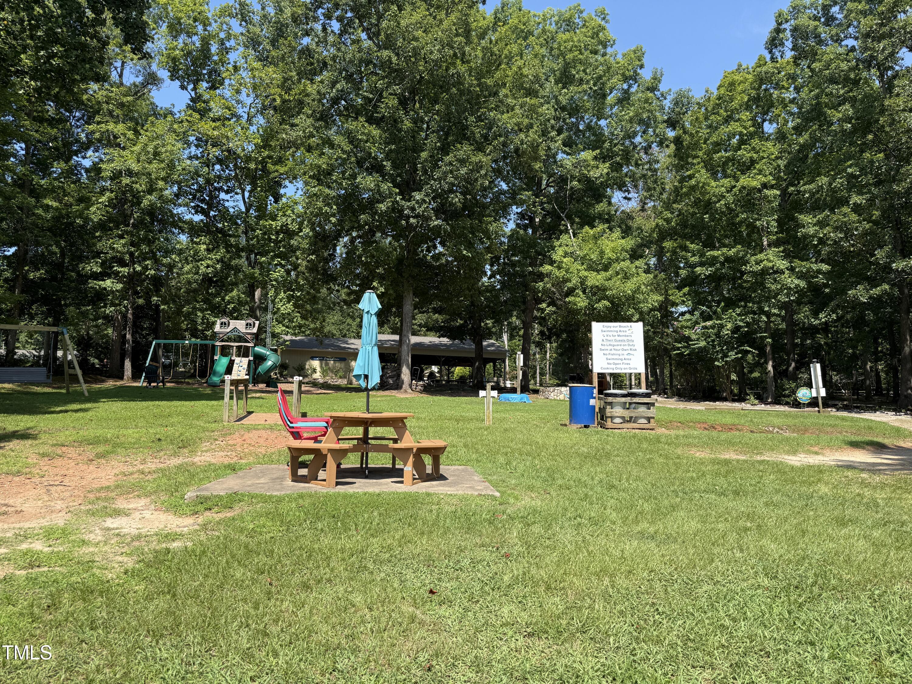 0 Summer Place Macon, NC 27551 - Photo 15 of 19 a childrens park with lots of swings and slides