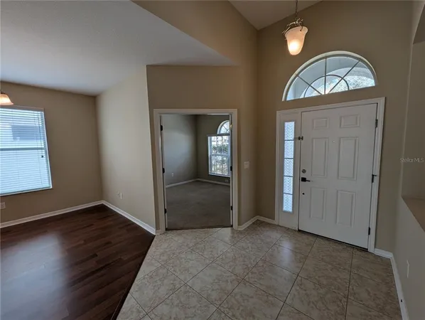 an empty room that has a window