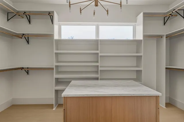 a view of a room with racks on the wall