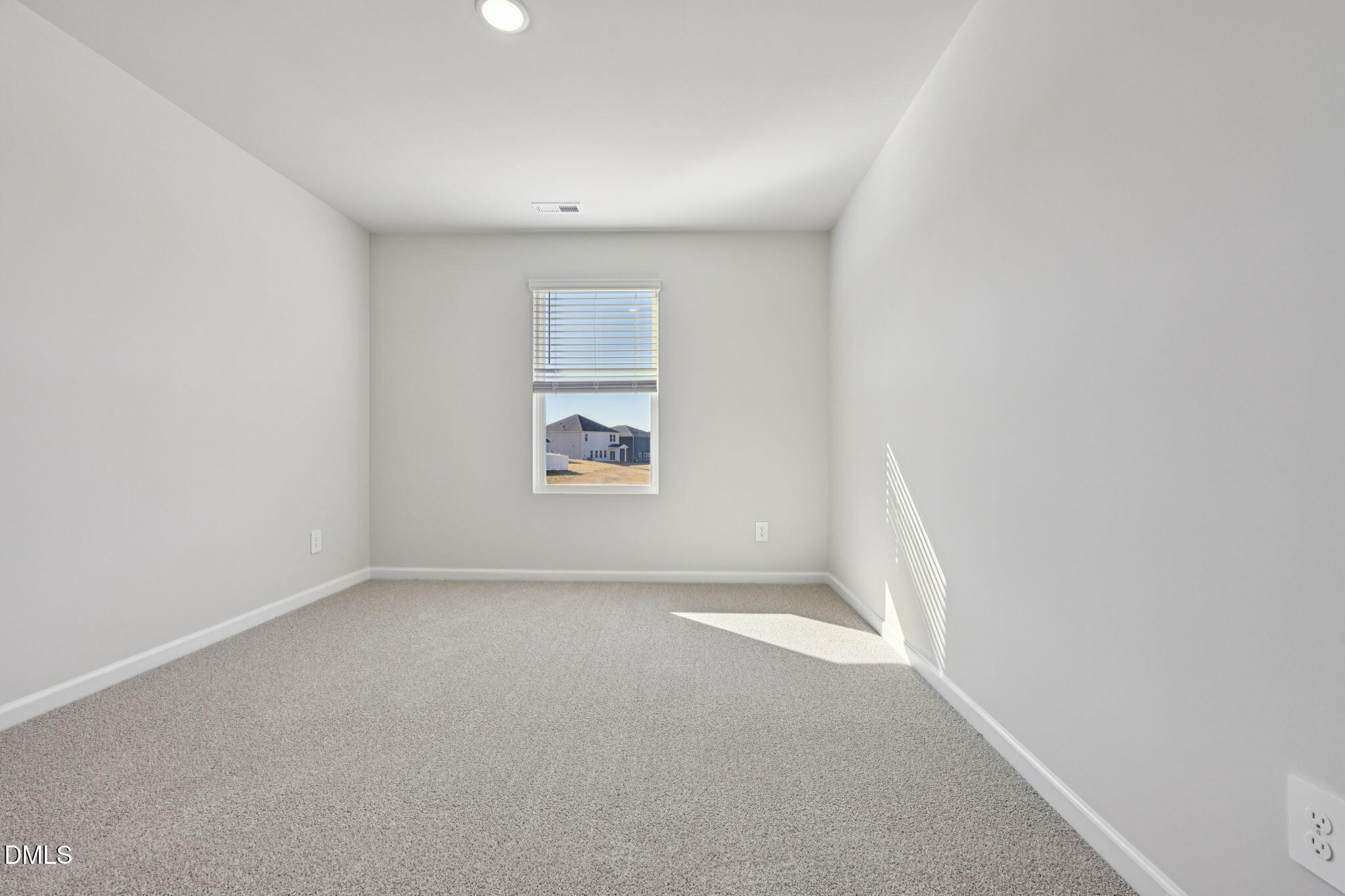2145 Topsail Road Durham, NC 27703 - Photo 29 of 49 an empty room with windows
