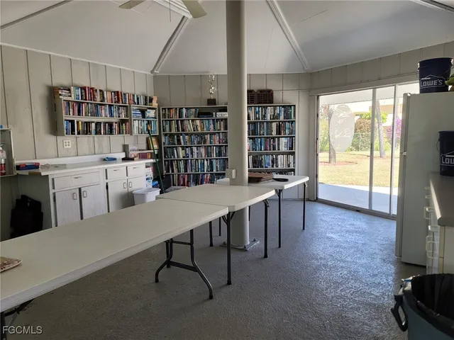 a room with furniture a table and a large window
