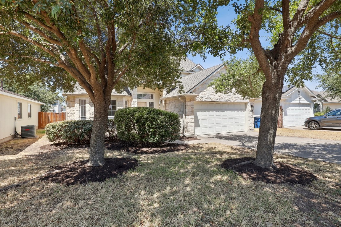 613 Colonial Park Boulevard Austin, TX 78745 - Photo 1 of 1 a view of a yard with a tree