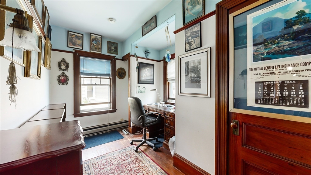 52 Thornton Park Winthrop, MA 02152 - Photo 16 of 40 a view of a livingroom with furniture and windows