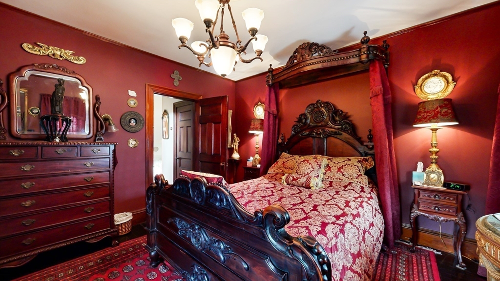 52 Thornton Park Winthrop, MA 02152 - Photo 21 of 40 a bedroom with a bed and a lamp on dresser