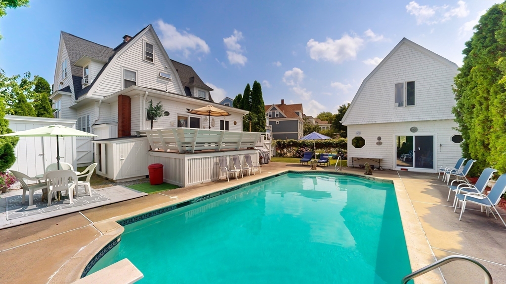 52 Thornton Park Winthrop, MA 02152 - Photo 28 of 40 a view of a house with pool and chairs