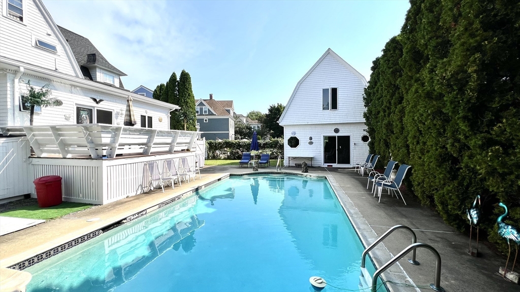52 Thornton Park Winthrop, MA 02152 - Photo 31 of 40 a view of a house with swimming pool and sitting area
