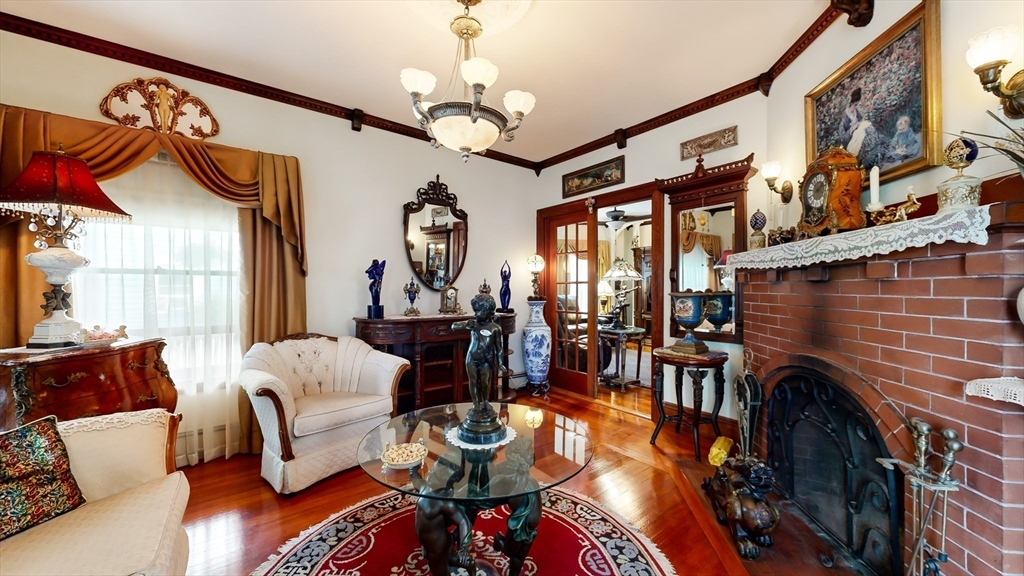 52 Thornton Park Winthrop, MA 02152 - Photo 7 of 40 a living room with furniture and wooden floor