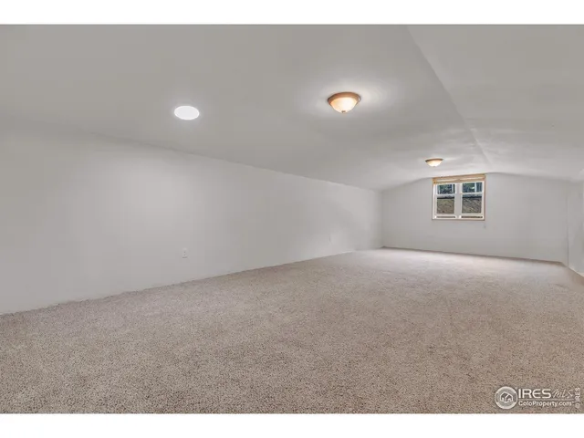 a view of empty room with windows