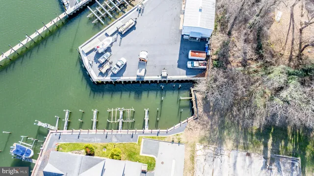 a view of swimming pool with a lake view