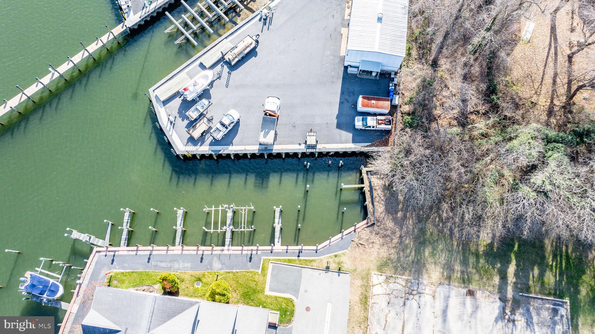 300 Muir Street Cambridge, MD 21613 - Photo 4 of 7 a view of swimming pool with a lake view
