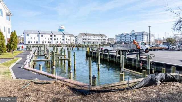a view of a balcony with two chairs