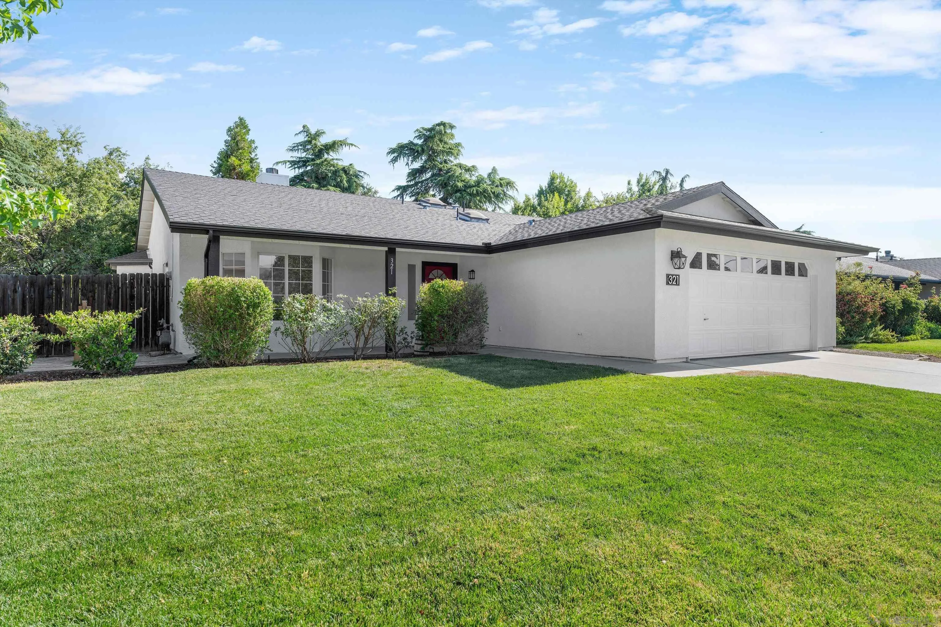 a view of a house with a garden