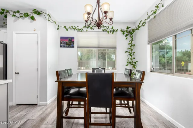 a view of a dining room with furniture window and outside view