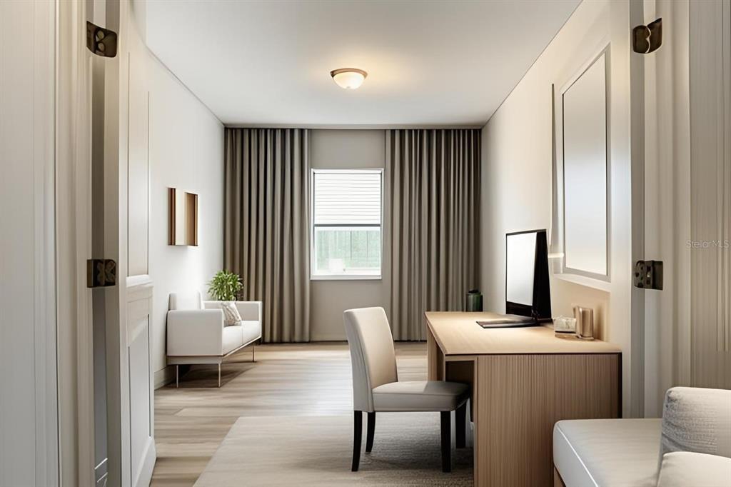 7 Tournament Road Rotonda West, FL 33947 - Photo 4 of 7 a living room with furniture and a large window