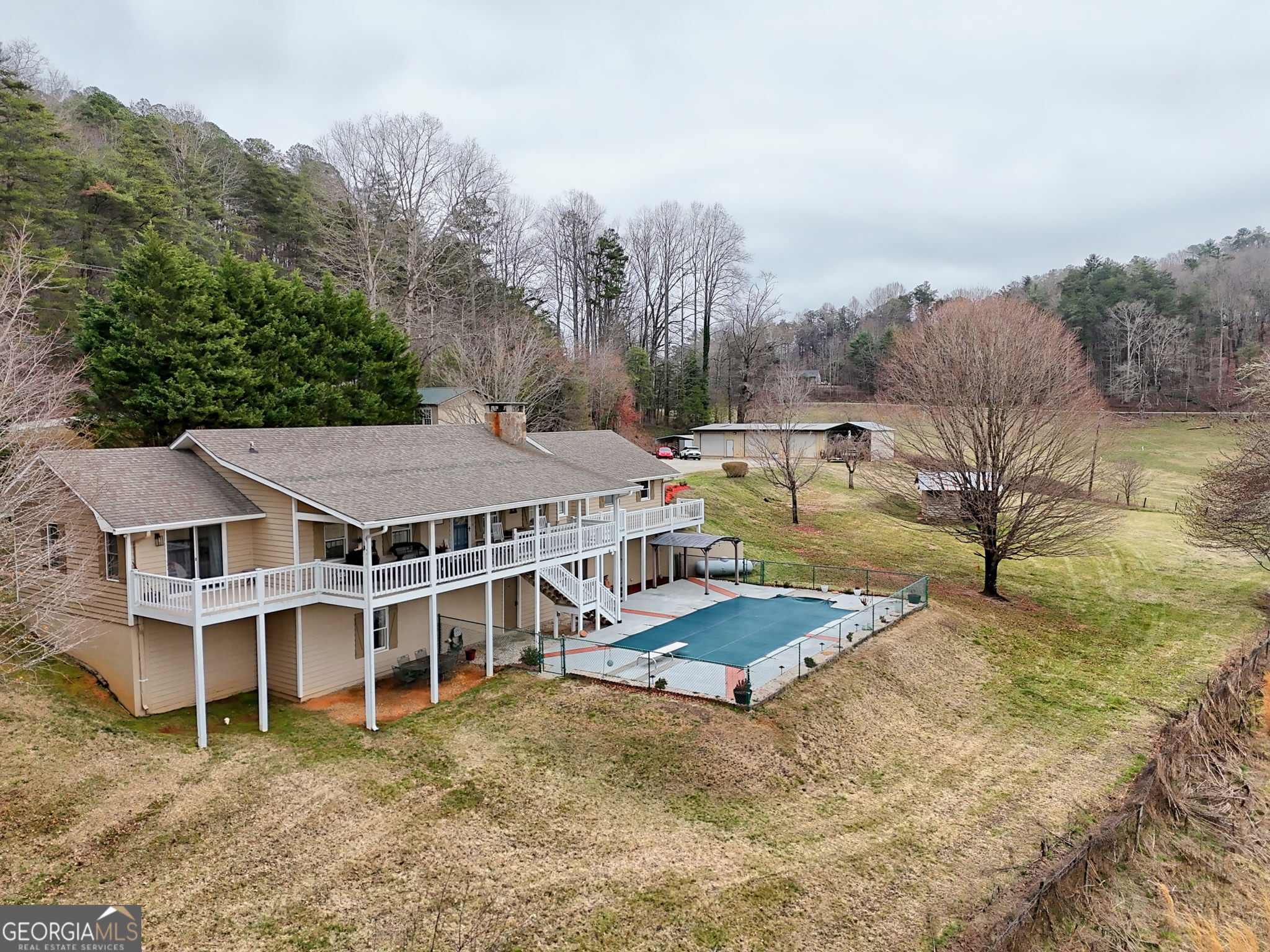 813 Tiger Conn Tiger, GA 30576 - Photo 1 of 1 a view of a house with pool and sitting area