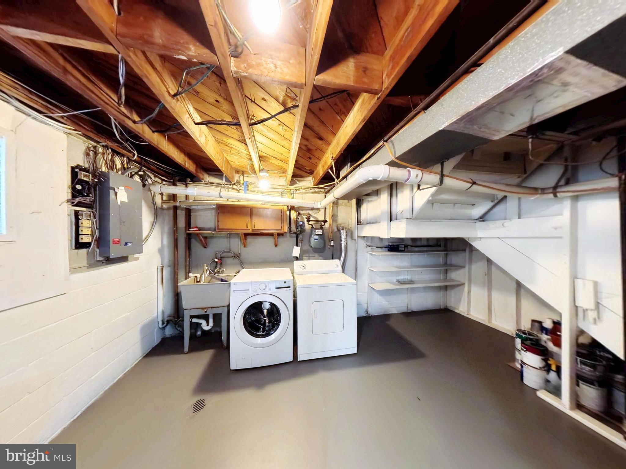 1012 Loxford Terrace Silver Spring, MD 20901 - Photo 29 of 52 a utility room with dryer and washer