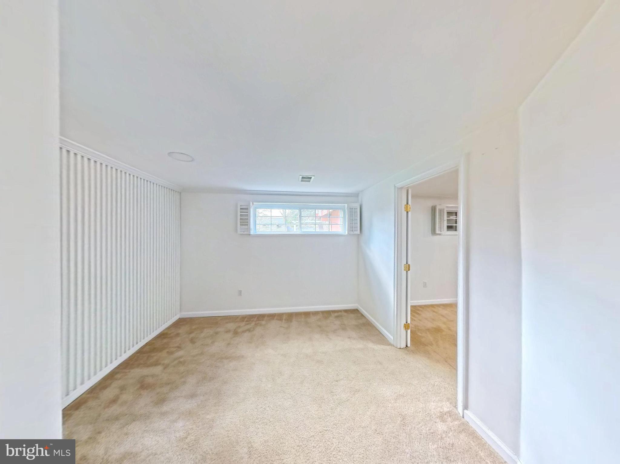 1012 Loxford Terrace Silver Spring, MD 20901 - Photo 33 of 52 an empty room with windows