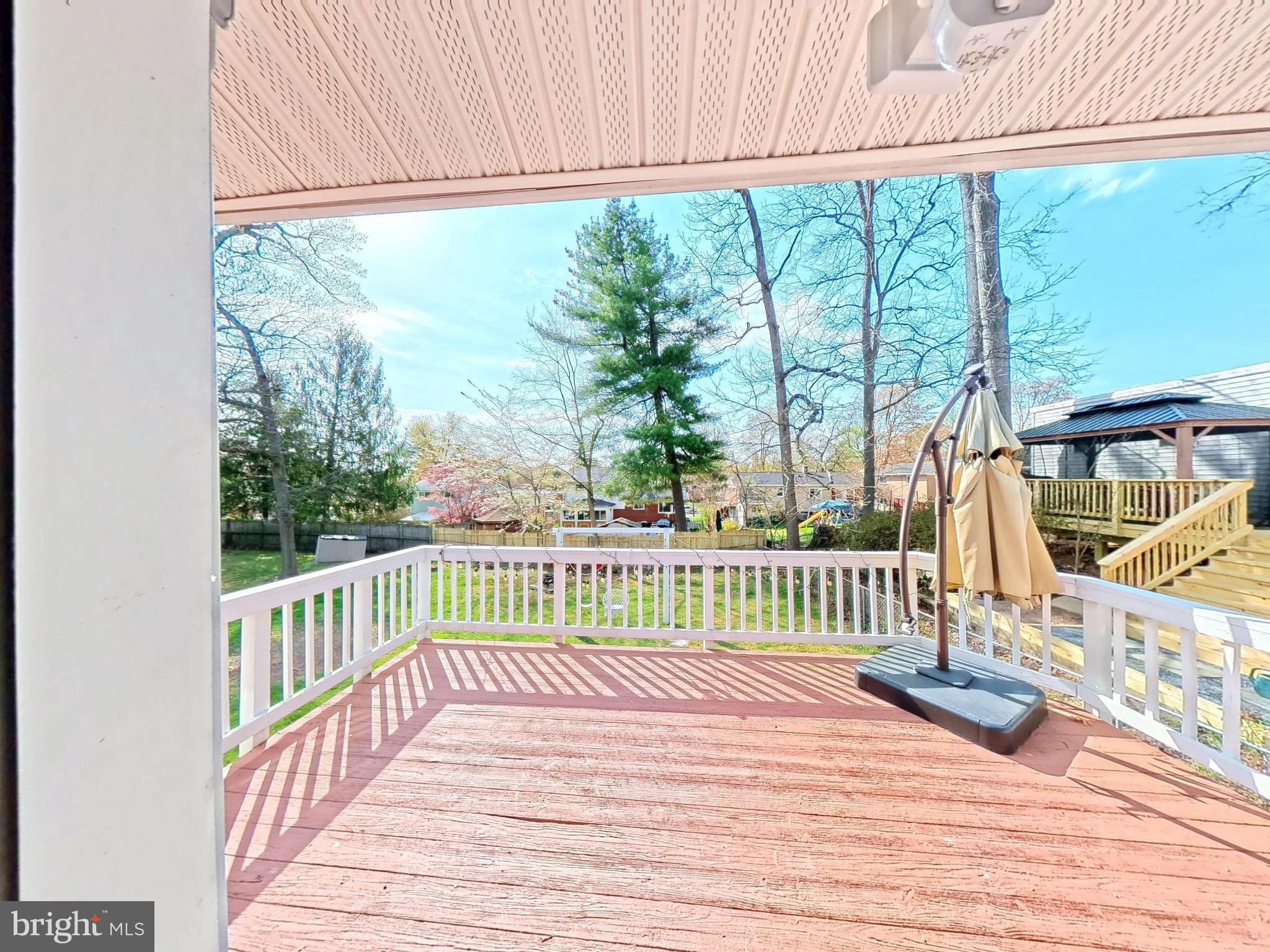 1012 Loxford Terrace Silver Spring, MD 20901 - Photo 34 of 52 a view of balcony with wooden floor