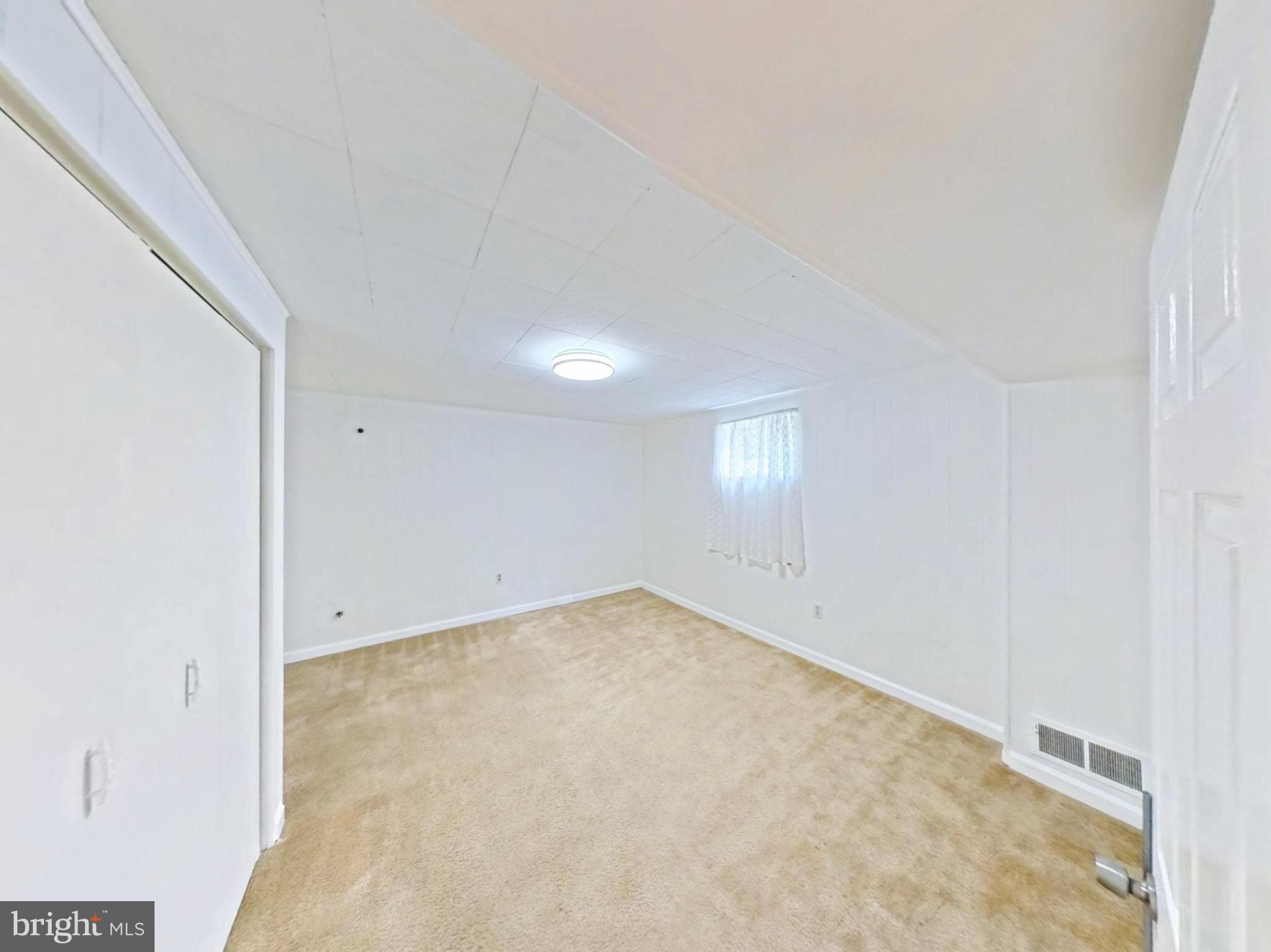 1012 Loxford Terrace Silver Spring, MD 20901 - Photo 50 of 52 an empty room with a natural light