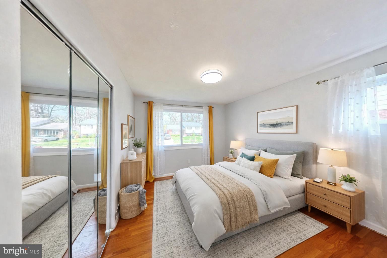 1012 Loxford Terrace Silver Spring, MD 20901 - Photo 9 of 52 a bedroom with a bed and wooden floor