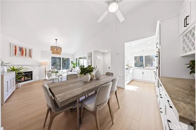 a kitchen with sink a stove and cabinets