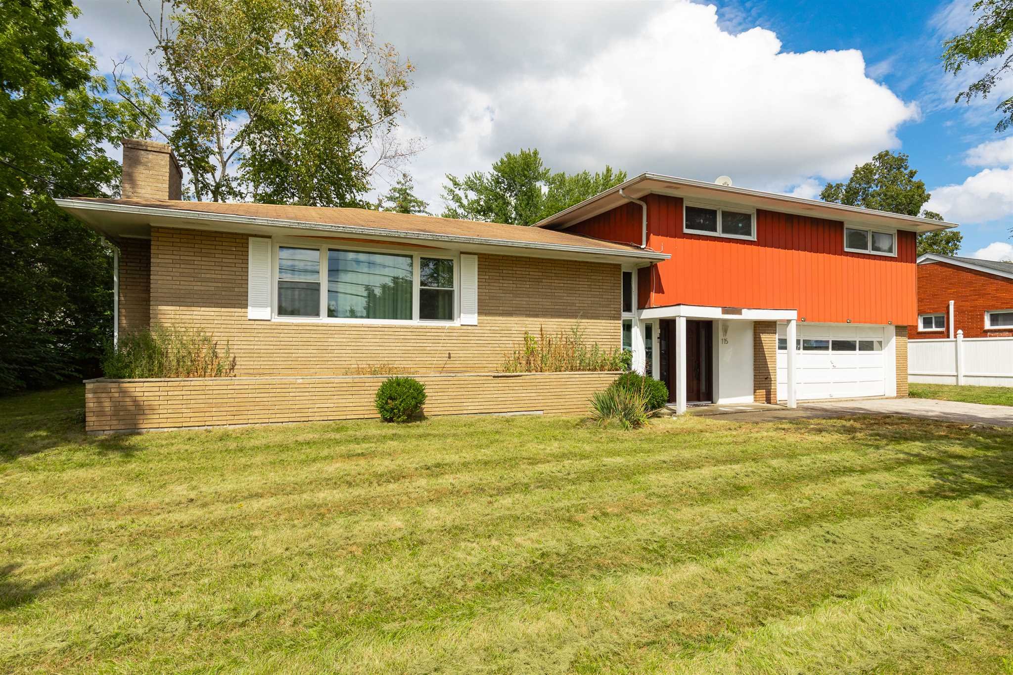 115 Spackenkill Road Poughkeepsie, NY 12603 - Photo 1 of 22 a house view with swimming pool in front of it