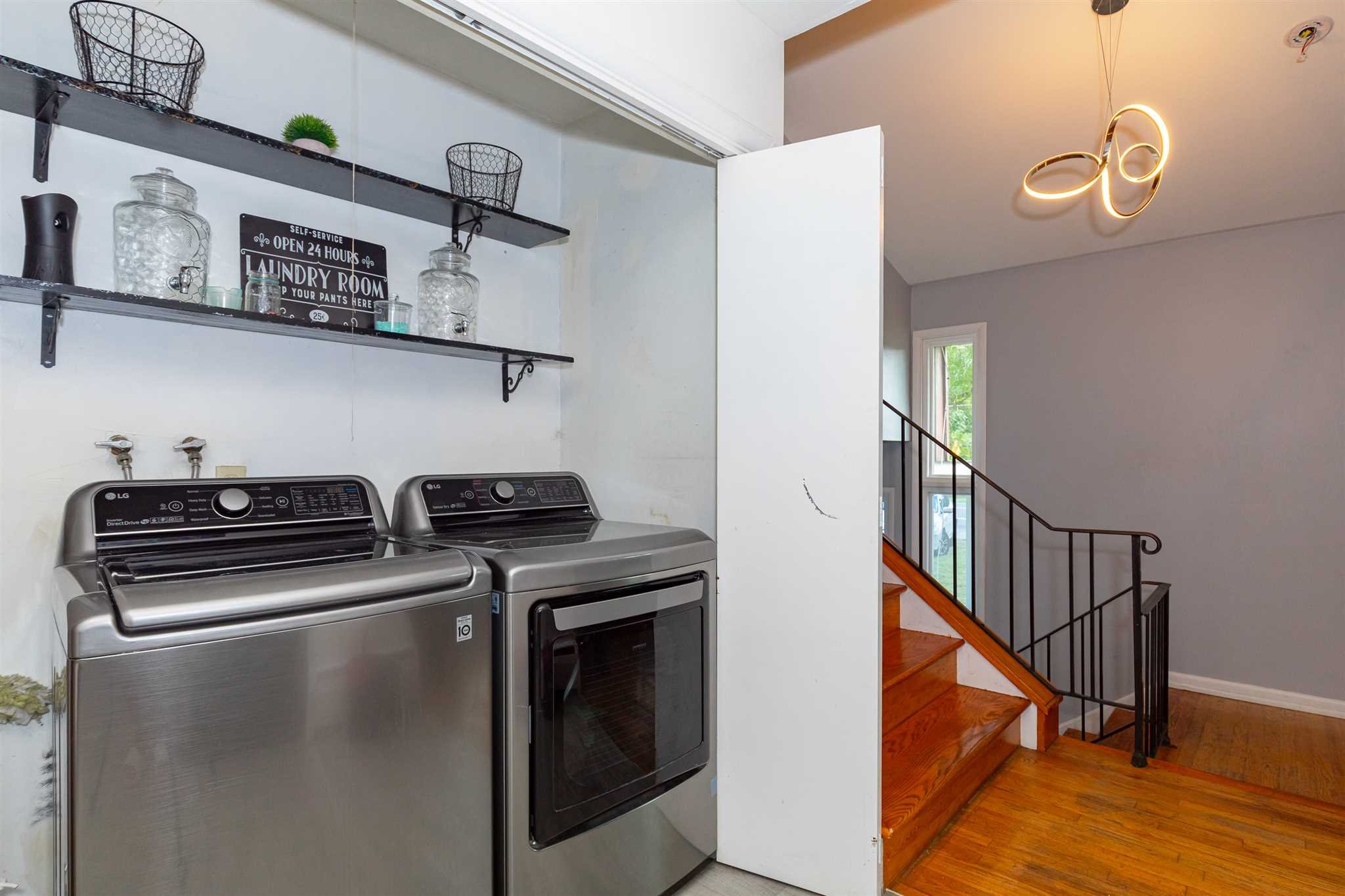 115 Spackenkill Road Poughkeepsie, NY 12603 - Photo 13 of 22 a kitchen with stainless steel appliances granite countertop a stove and a microwave