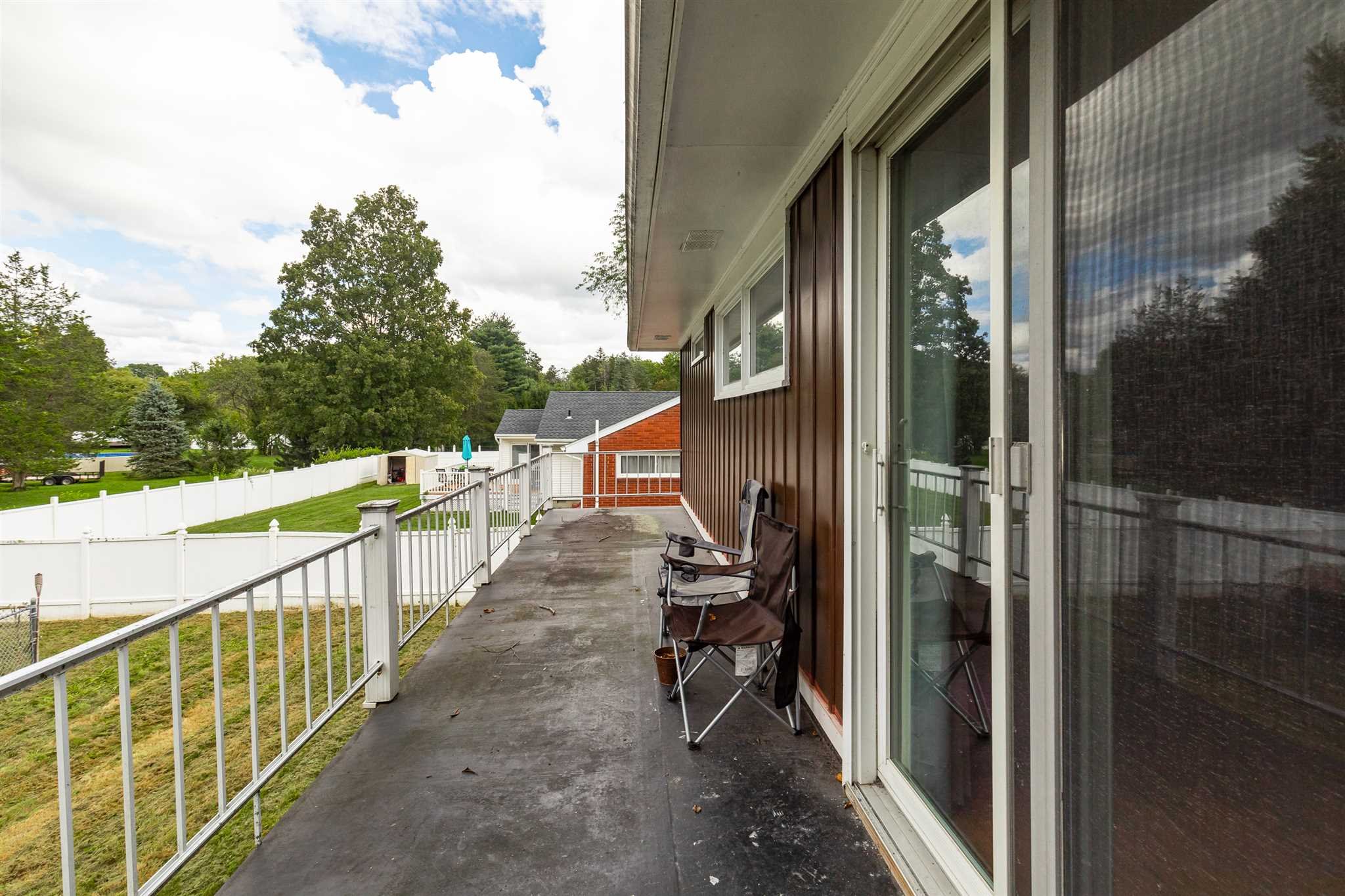 115 Spackenkill Road Poughkeepsie, NY 12603 - Photo 16 of 22 a view of a balcony with chairs