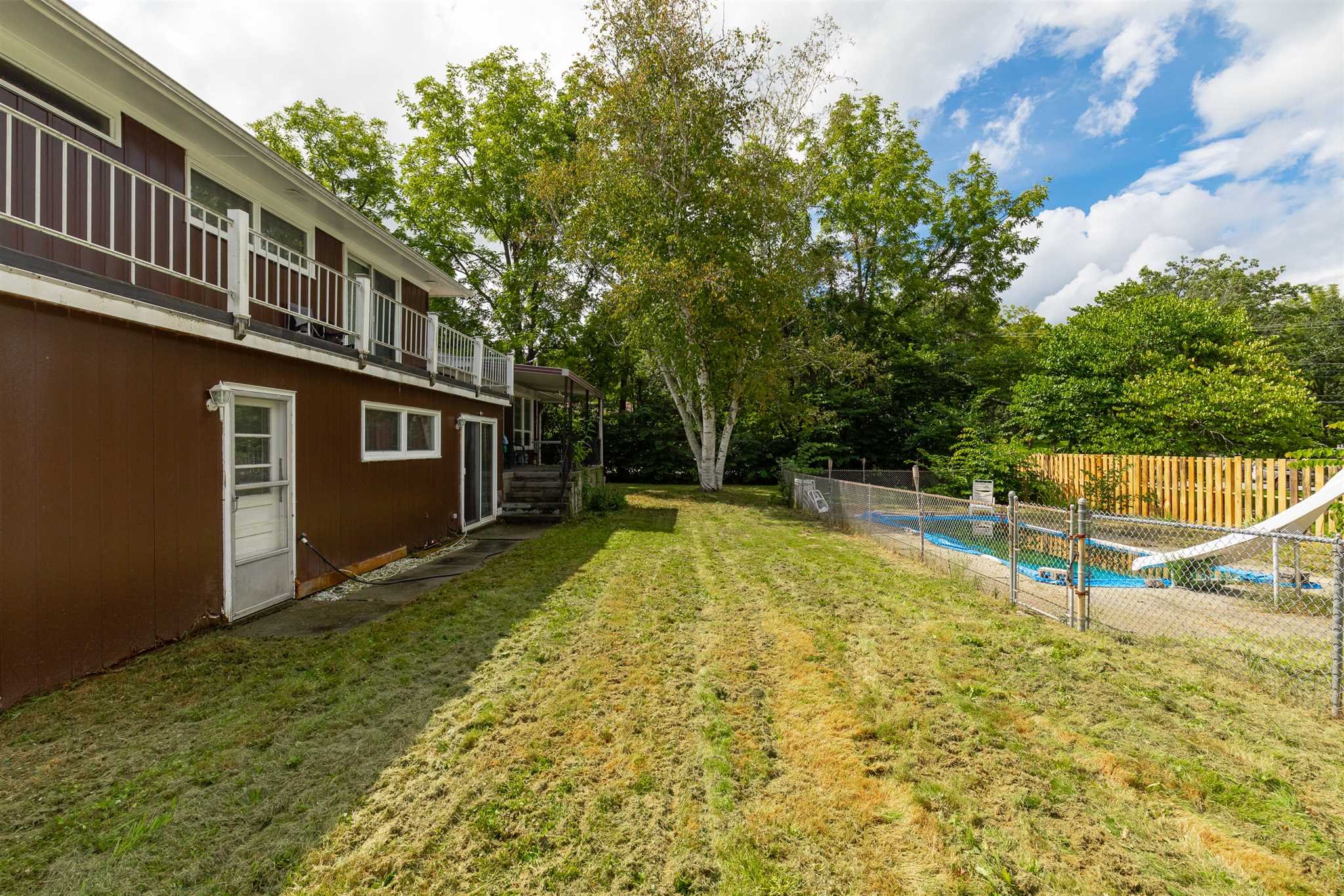 115 Spackenkill Road Poughkeepsie, NY 12603 - Photo 3 of 22 a view of swimming pool with a backyard