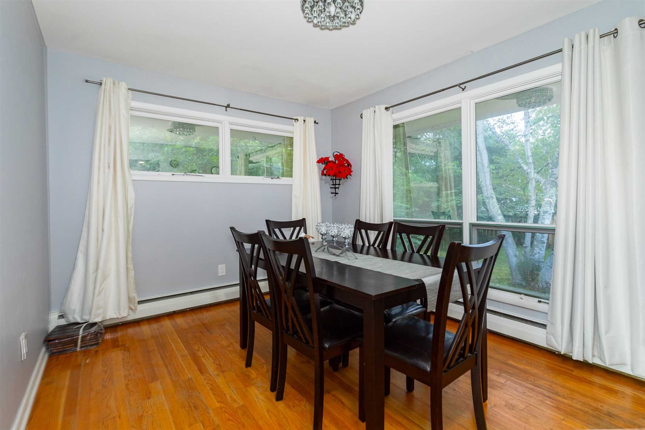 115 Spackenkill Road Poughkeepsie, NY 12603 - Photo 10 of 22 a view of a dining room with furniture window and wooden floor